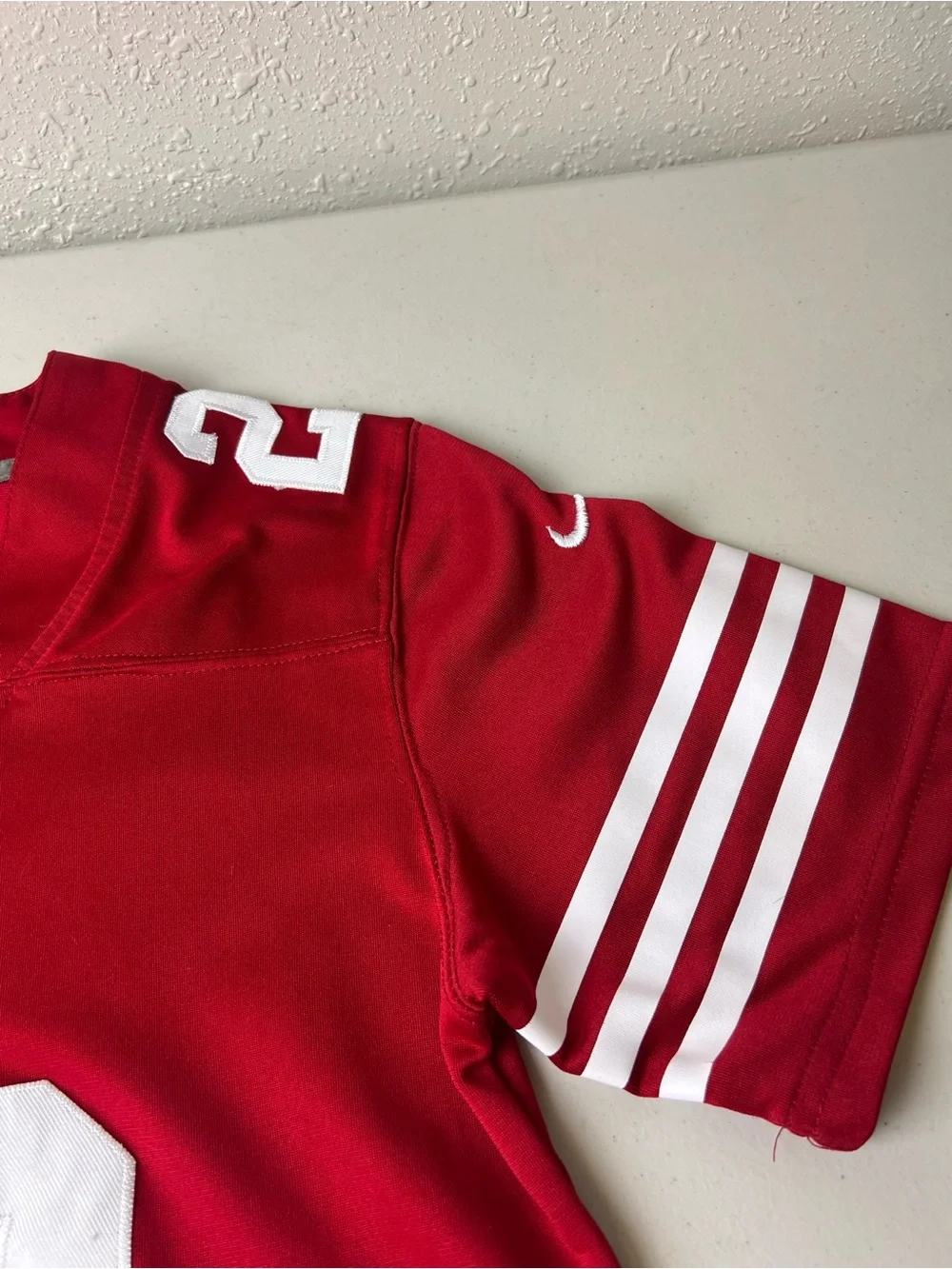 Nike Youth Large San Francisco 49ers #23 McCaffrey Red Football Jersey NFL